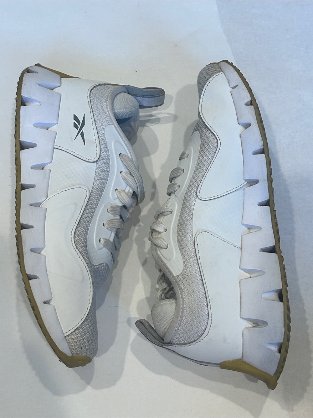 Reebok women’s White and Light Gray Trail-Style Sneakers 8